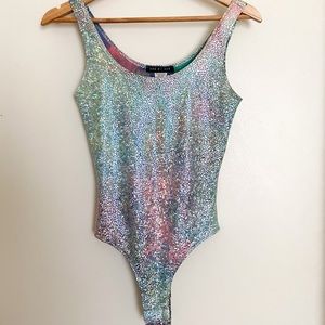 Holographic silver body suit